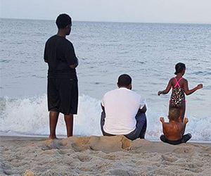 A family on respite at the beach sponsored by A Week Away.