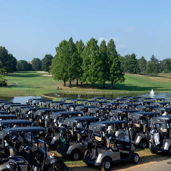Golf carts lined up ready for the shot gun start at Hershey Country Club.